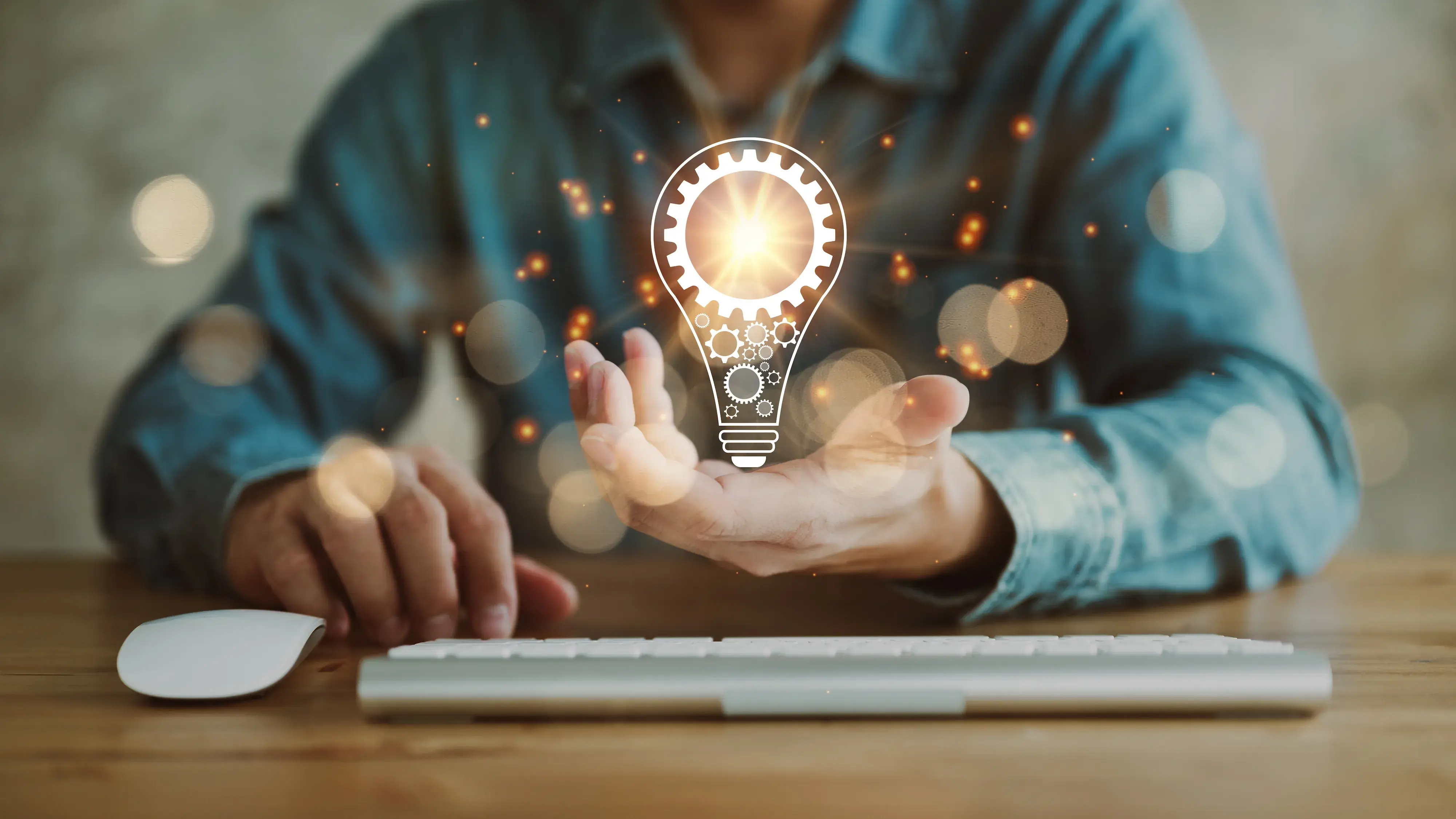 Person holding lightbulb